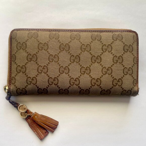 Gucci GG Canvas Zippy Wallet with Leather Fringe - Picture 1 of 6